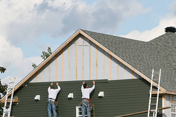 Professional Siding Installation technician working in Bloomington, MD